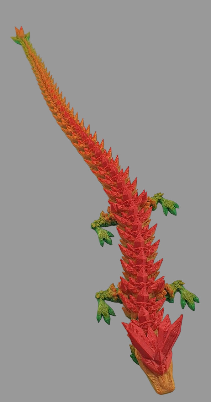 orange and green dragon model on a gray background